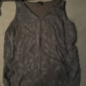 sleeveless top with flower detail